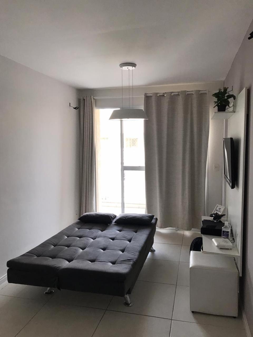 Mediterraneo 507: Beachfront Comfort with BBQ and High-Speed Internet Cabo Frio Room photo